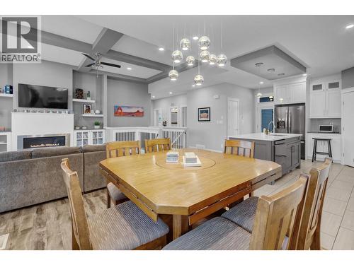 4711 Gannett Road, Prince George, BC - Indoor Photo Showing Dining Room With Fireplace