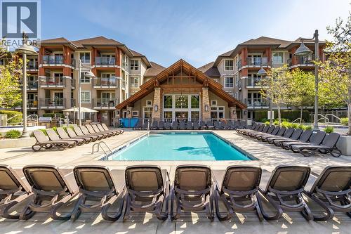 1093 Sunset Drive Unit# 105, Kelowna, BC - Outdoor With In Ground Pool