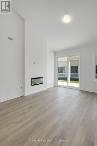 701 Sargeant Place, Innisfil, ON - Indoor Photo Showing Living Room With Fireplace