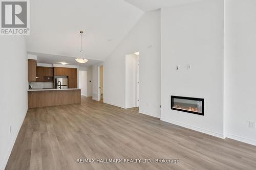 701 Sargeant Place, Innisfil, ON - Indoor Photo Showing Other Room With Fireplace