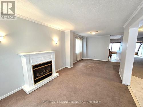 Living & dining room - 2425 Headon Forest Drive, Burlington, ON - Indoor With Fireplace