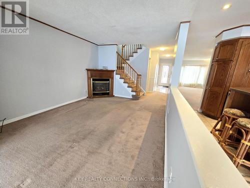 Family overlooking kitchen & sunroom - 2425 Headon Forest Drive, Burlington, ON - Indoor With Fireplace