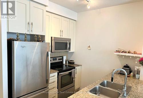 4403 - 4070 Confederation Parkway, Mississauga, ON - Indoor Photo Showing Kitchen With Double Sink