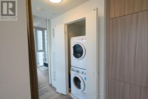 1910 - 290 Adelaide Street W, Toronto, ON - Indoor Photo Showing Laundry Room