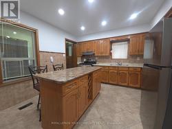 5 RIDEAU AVENUE  Toronto, ON M6K 1S1