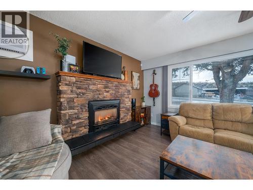 4840 Scotty Creek Road, Kelowna, BC - Indoor Photo Showing Living Room With Fireplace