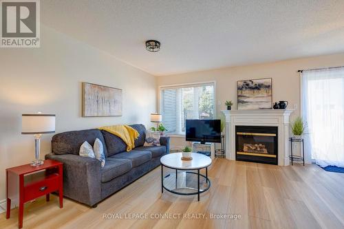 59 Bar Harbour Square, Toronto, ON - Indoor Photo Showing Living Room With Fireplace