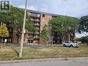 6624 Thornberry Unit# 207, Windsor, ON  - Outdoor With Balcony With Facade 