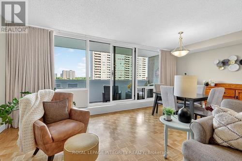 The custom made curtains cover all windows. - 704 - 265 Poulin Avenue, Ottawa, ON - Indoor Photo Showing Living Room