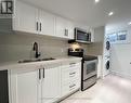 Lower - 24 Dunraven Drive, Toronto, ON  - Indoor Photo Showing Kitchen With Stainless Steel Kitchen With Double Sink 