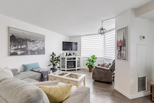 305-236 Albion Road, Toronto, ON - Indoor Photo Showing Living Room With Fireplace