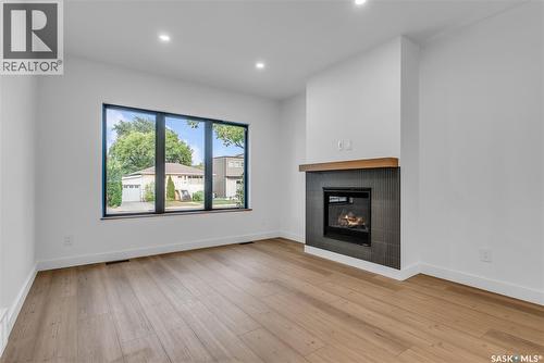 1313 Edward Avenue, Saskatoon, SK - Indoor Photo Showing Living Room With Fireplace