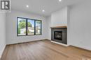 1313 Edward Avenue, Saskatoon, SK  - Indoor Photo Showing Living Room With Fireplace 