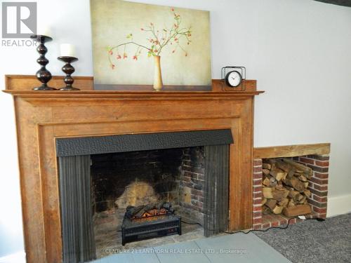 Fireplace with insert - 644 County 10 Road, Prince Edward County (Hallowell Ward), ON - Indoor Photo Showing Living Room With Fireplace