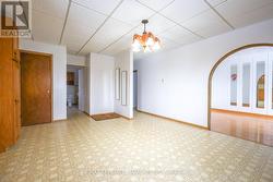 From kitchen showing archway into livingroom - 