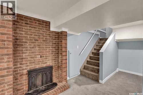 908 Shannon Road, Regina, SK - Indoor With Fireplace