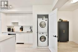 In- Suite Laundry, Stacked Washer & Dryer - 