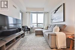 Living Room With Walkout To Balcony, Large Windows - 