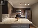306 - 1450 Bishops Gate, Oakville, ON  - Indoor Photo Showing Kitchen With Stainless Steel Kitchen With Double Sink 