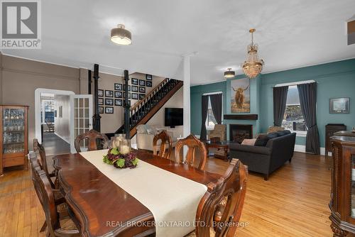 1002 Cowbell Lane N, Gravenhurst, ON - Indoor Photo Showing Dining Room With Fireplace