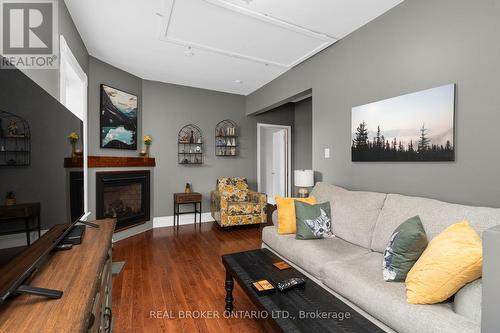 1002 Cowbell Lane N, Gravenhurst, ON - Indoor Photo Showing Living Room With Fireplace
