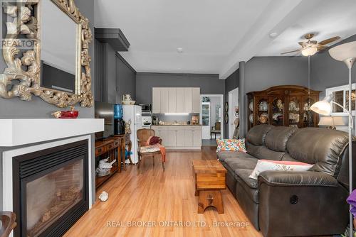 1002 Cowbell Lane N, Gravenhurst, ON - Indoor Photo Showing Living Room With Fireplace