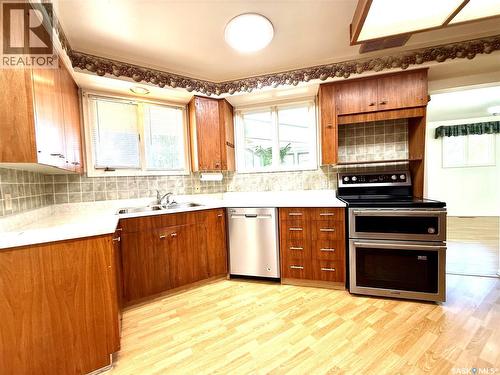 7 Driftwood Crescent, Yorkton, SK - Indoor Photo Showing Kitchen With Double Sink