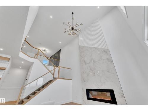 744 Astoria Wy, Devon, AB - Indoor Photo Showing Other Room With Fireplace