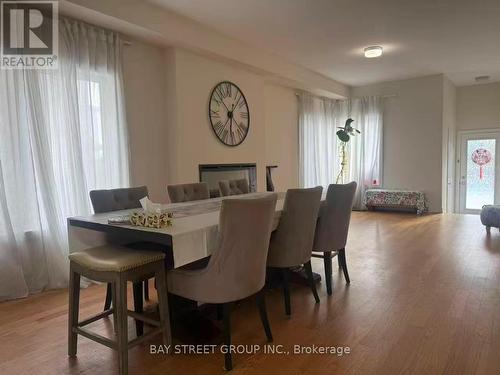 124 Old Oak Lane, Markham, ON - Indoor Photo Showing Dining Room With Fireplace
