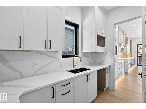 1926 Ainslie Link Sw, Edmonton, AB - Indoor Photo Showing Kitchen With Double Sink