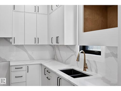 1926 Ainslie Link Sw, Edmonton, AB - Indoor Photo Showing Kitchen With Double Sink