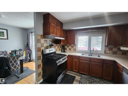 115 Ekota Cr Nw, Edmonton, AB - Indoor Photo Showing Kitchen With Double Sink