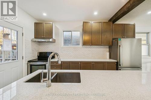 46 East 7Th Street, Hamilton, ON - Indoor Photo Showing Kitchen With Double Sink