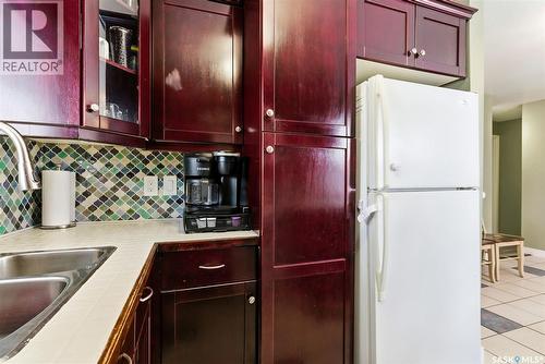 874 Callander Crescent N, Regina, SK - Indoor Photo Showing Kitchen With Double Sink