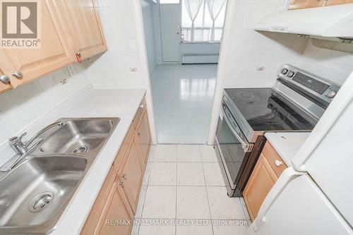411 - 50 Lotherton Pathway, Toronto, ON - Indoor Photo Showing Kitchen With Double Sink