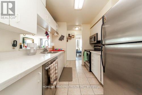 2117 - 35 Trailwood Drive, Mississauga, ON - Indoor Photo Showing Kitchen With Double Sink