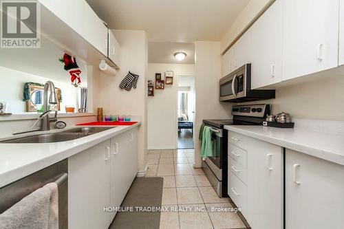 2117 - 35 Trailwood Drive, Mississauga, ON - Indoor Photo Showing Kitchen With Double Sink