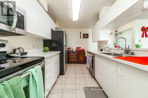 2117 - 35 Trailwood Drive, Mississauga, ON - Indoor Photo Showing Kitchen With Double Sink