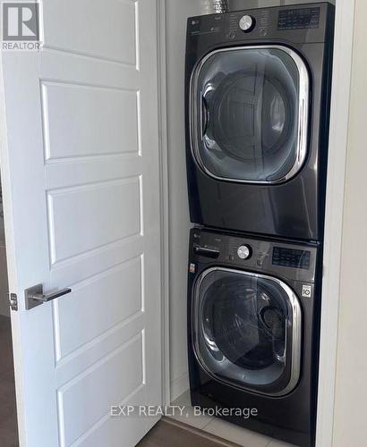 401 - 3028 Creekshore Common, Oakville (Go Glenorchy), ON - Indoor Photo Showing Laundry Room