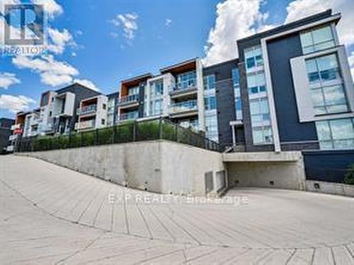 401 - 3028 Creekshore Common, Oakville (Go Glenorchy), ON - Outdoor With Facade