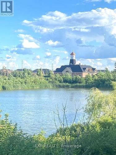 401 - 3028 Creekshore Common, Oakville (Go Glenorchy), ON - Outdoor With Body Of Water With View