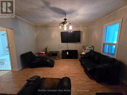 Living Room with Walkout To Side Porch - 8 Mill Street, Severn (Coldwater), ON - Indoor