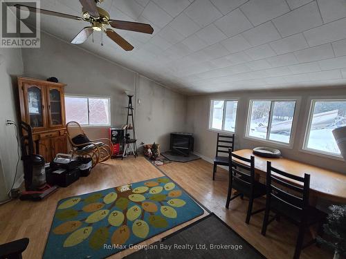 Den - 8 Mill Street, Severn (Coldwater), ON - Indoor With Fireplace