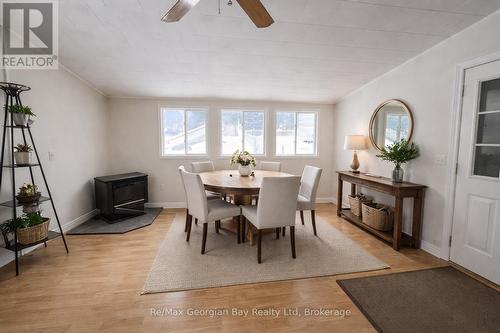 Virtually staged dining/entrance area. - 8 Mill Street, Severn (Coldwater), ON - Indoor Photo Showing Dining Room