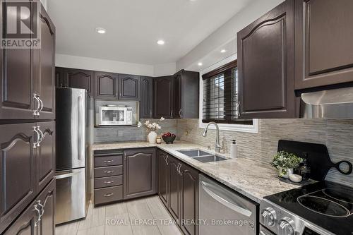 27 Sandcliffe Terrace, Ottawa, ON - Indoor Photo Showing Kitchen With Double Sink