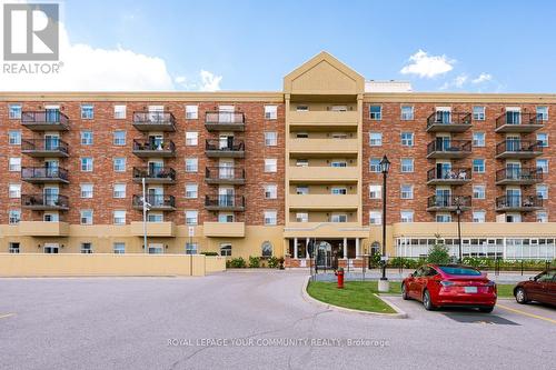 206 - 7373 Martin Grove Road, Vaughan, ON - Outdoor With Balcony With Facade