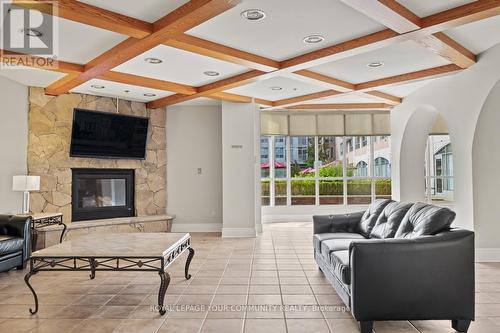 206 - 7373 Martin Grove Road, Vaughan, ON - Indoor Photo Showing Other Room With Fireplace