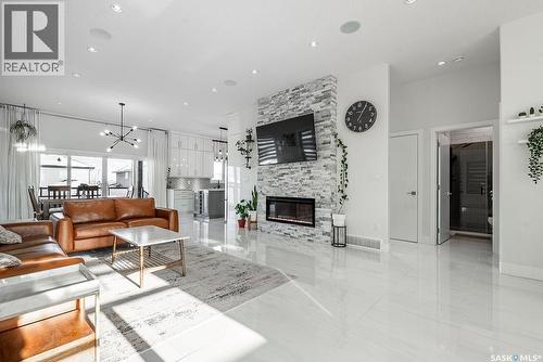 511 Burgess Crescent, Saskatoon, SK - Indoor Photo Showing Living Room With Fireplace
