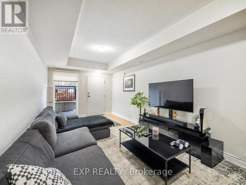 101 - 8825 Sheppard Avenue E, Toronto, ON - Indoor Photo Showing Living Room
