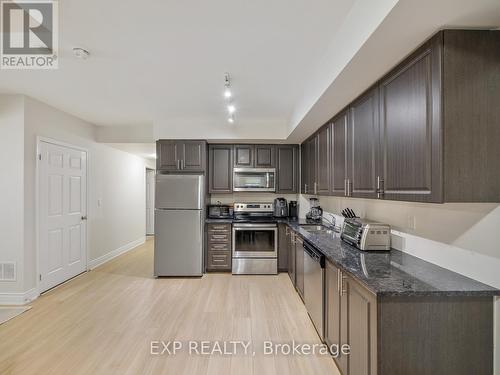 101 - 8825 Sheppard Avenue E, Toronto, ON - Indoor Photo Showing Kitchen With Double Sink